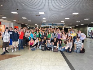 The Concert Choir poses in an airport on their way to Brazil.