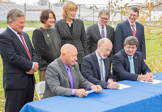 Gov. Wolf signs legislation at Elizabethtown College solar array